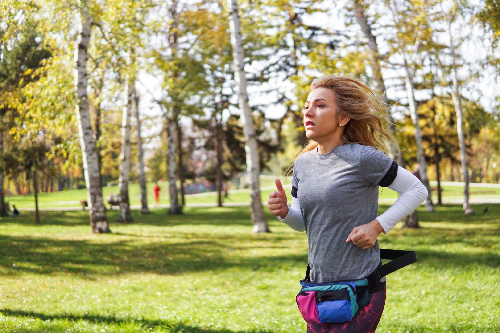 Woman jogging at sunrise